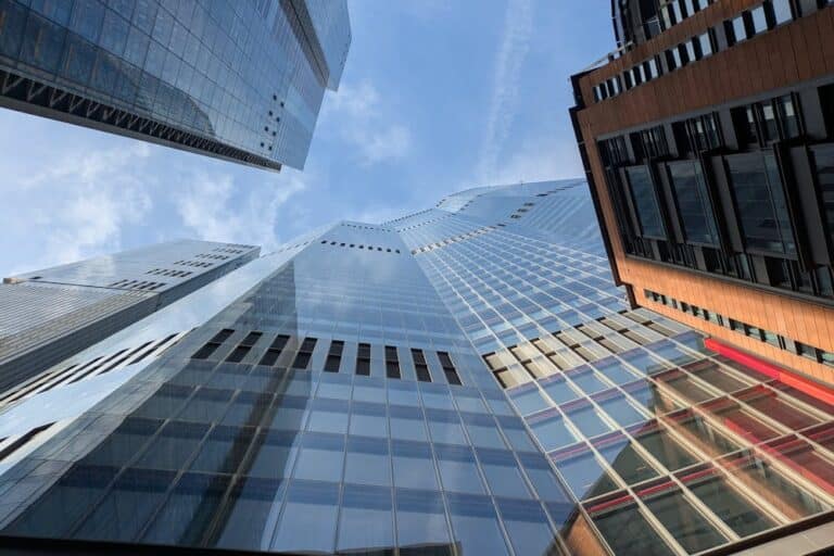 multiple skyscrapers photographed from the ground